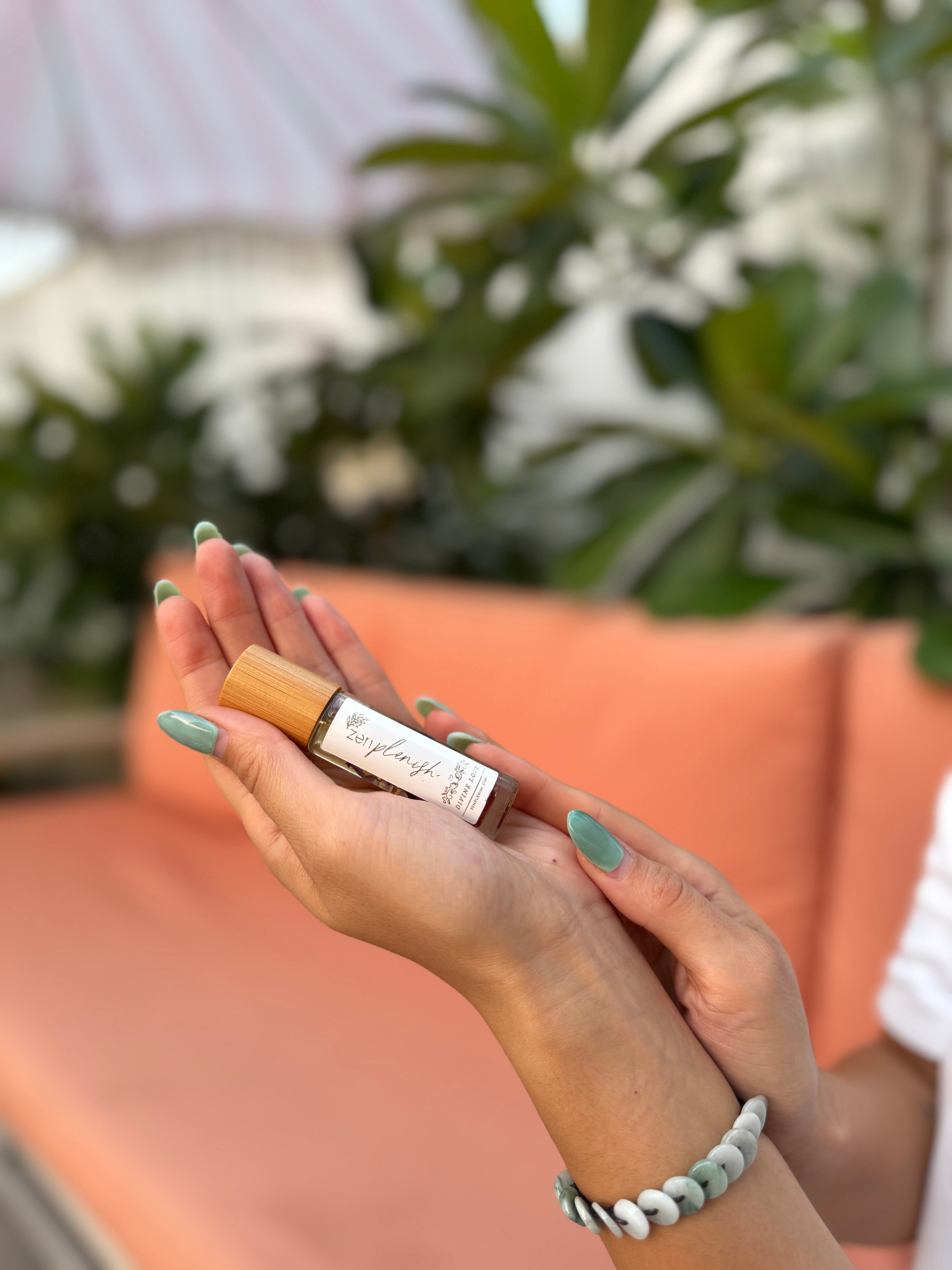 Clean Luxury Essential oil roll on, zenplenish, natural fragrance, 24K gold, crystals, girl hands